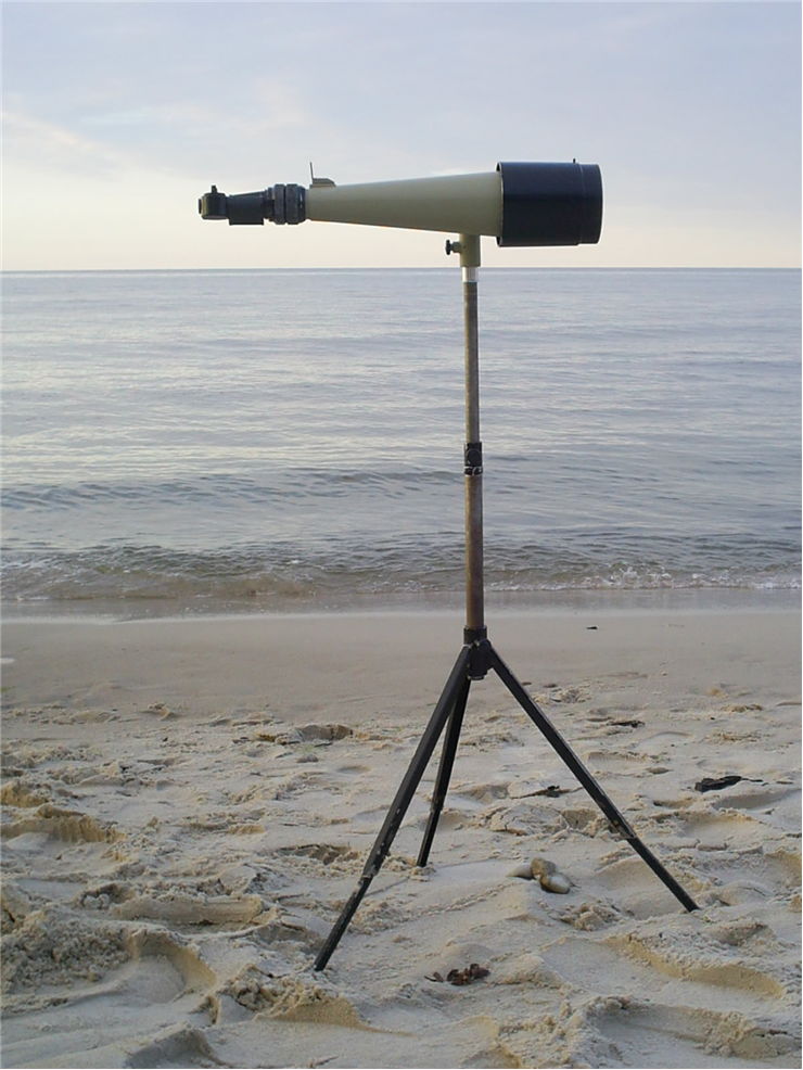 Picture Of Old Telescope On Beach